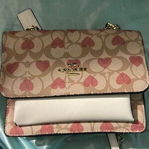 Coach Pink and Gold Crossbody Bag with Heart Design